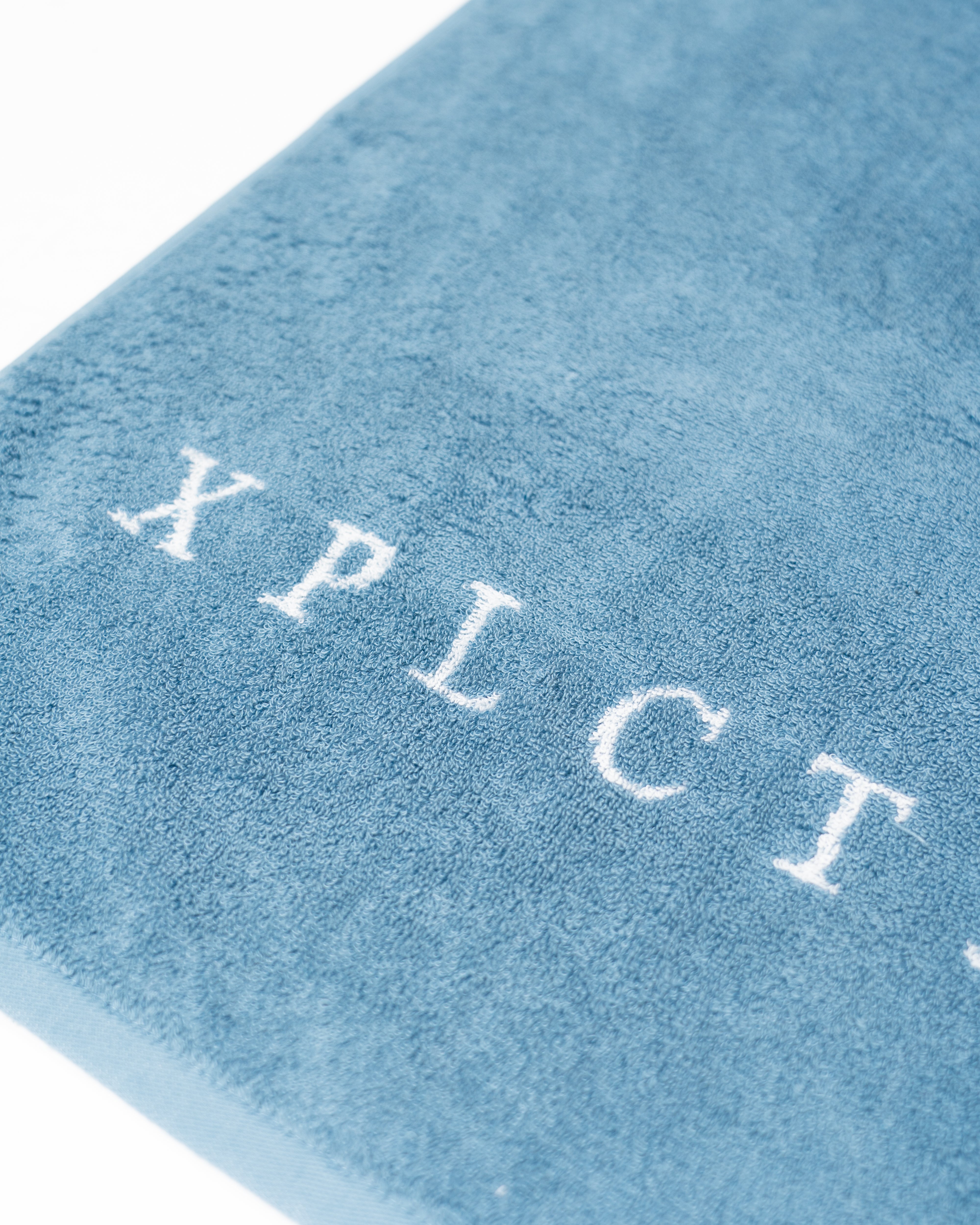 Badhanddoek Xplct Studios