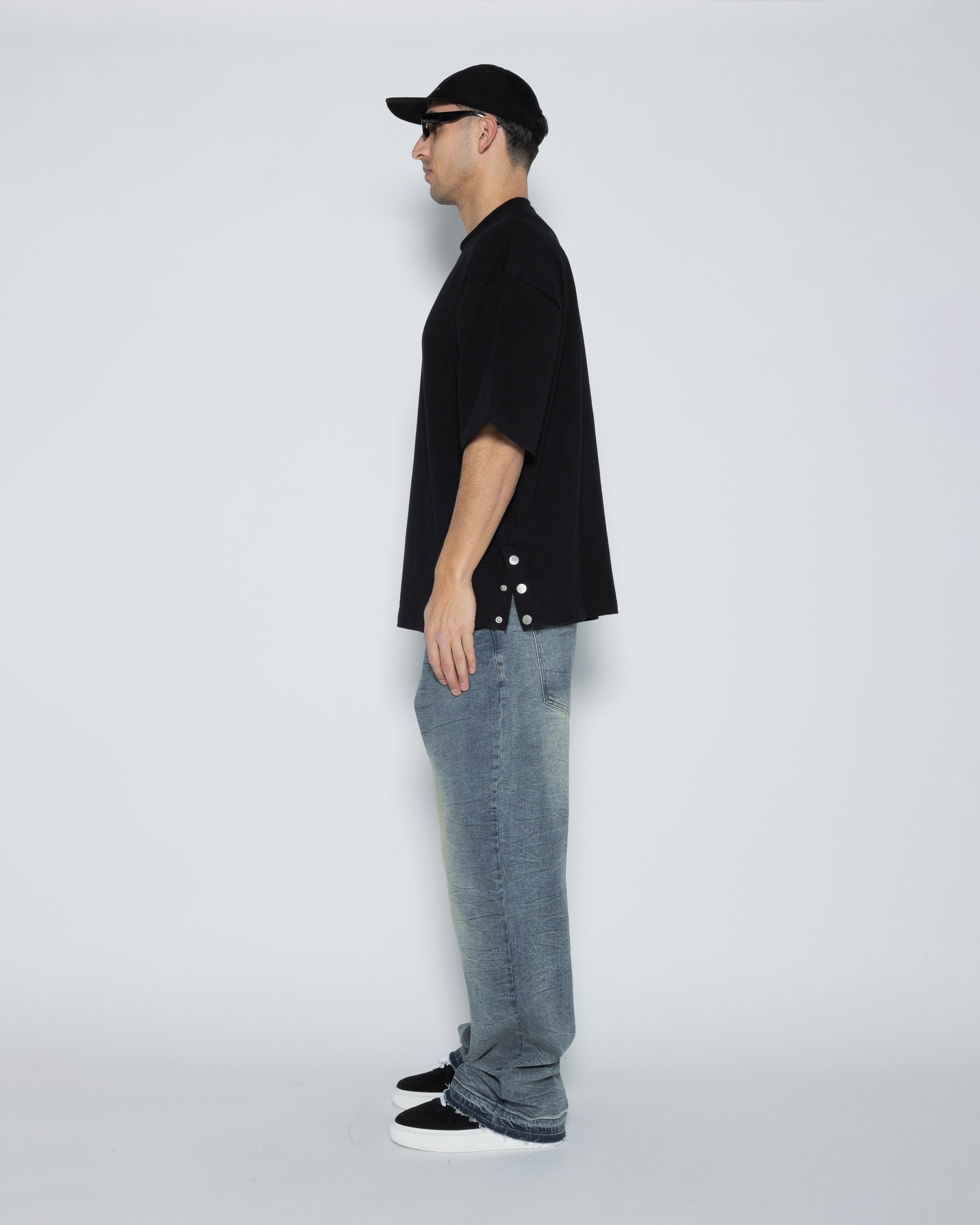 Rema Blanco very oversized t-shirt with button hem closure