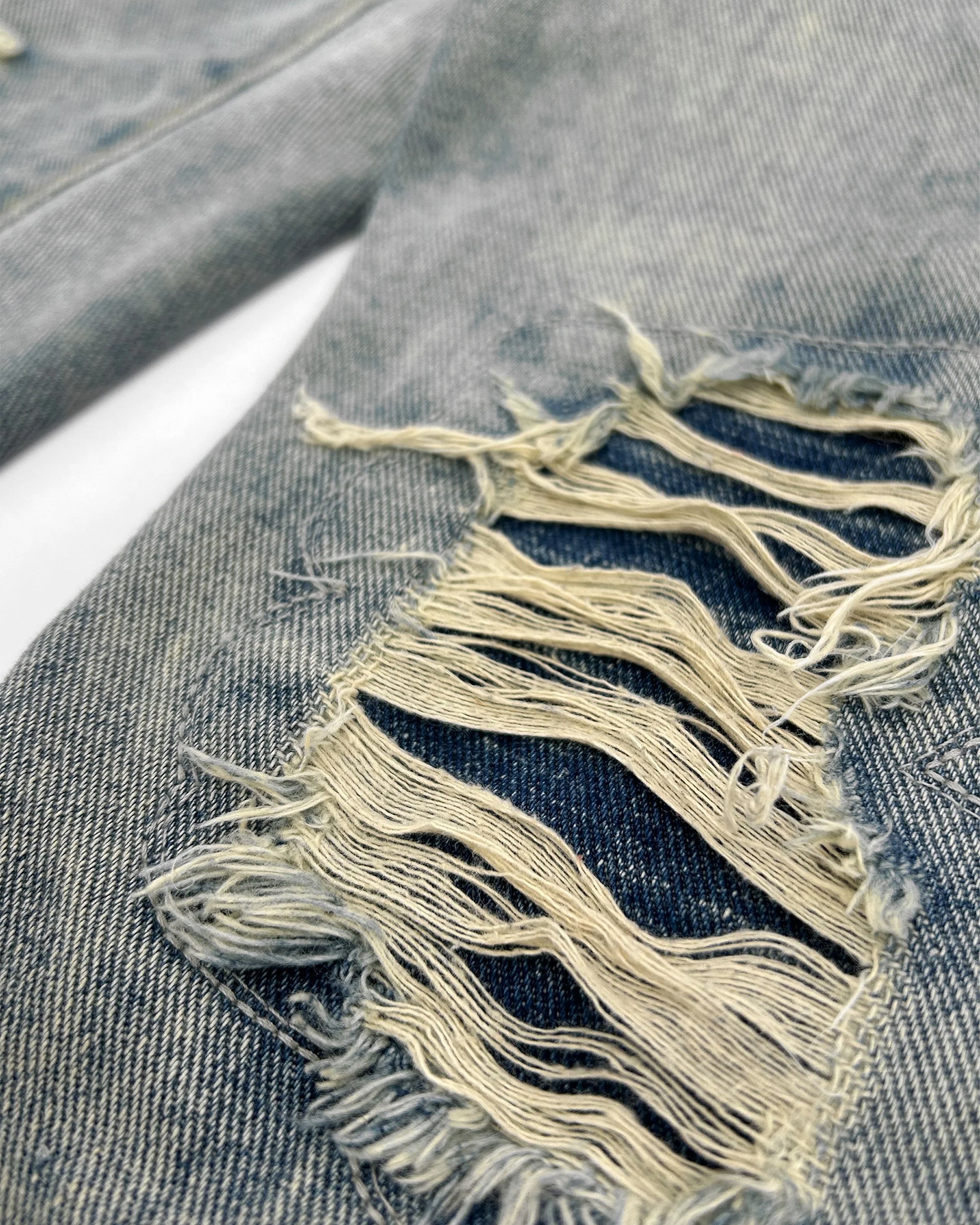 Distressed Denim Jeans